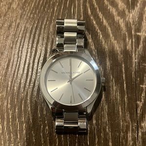 Michael Kors, silver watch. Needs new battery.